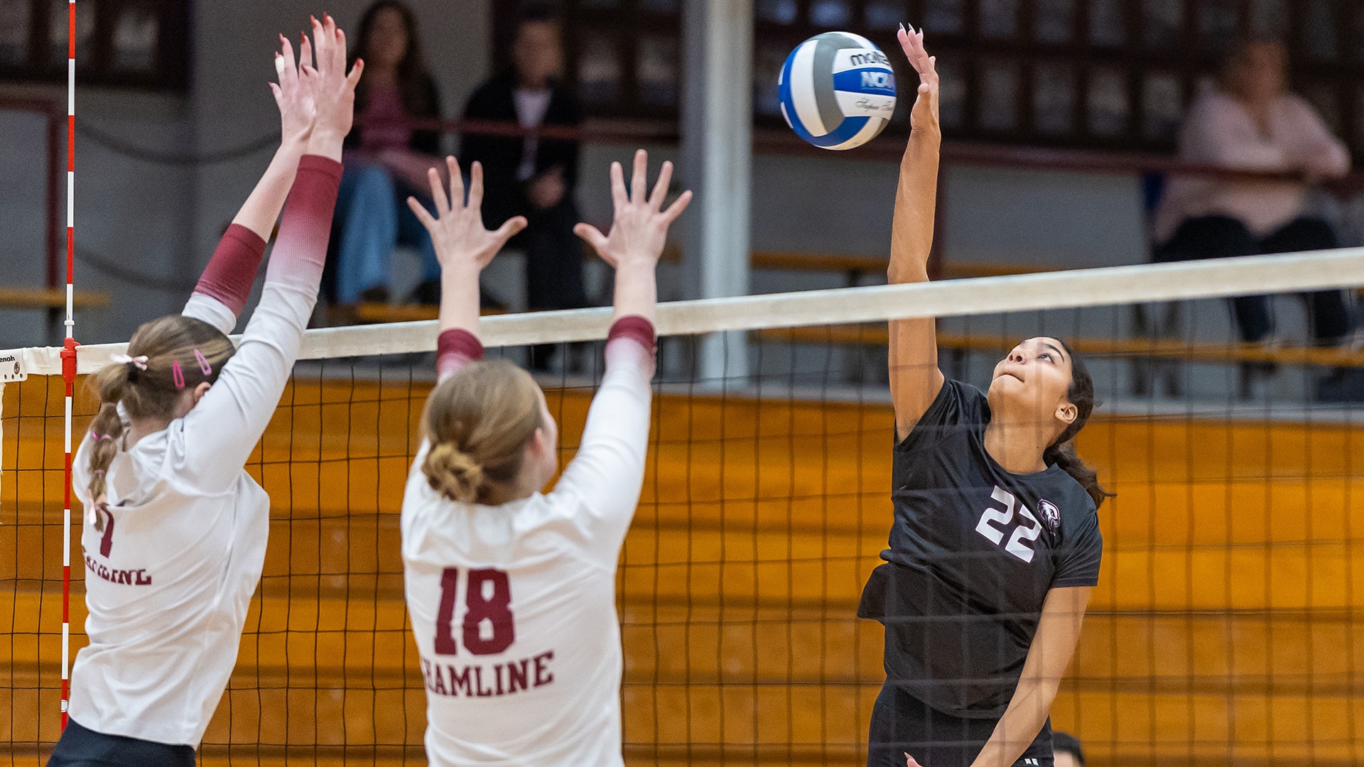 Lilly Wynn attacks the ball during a 2026 Augsburg volleyball match.