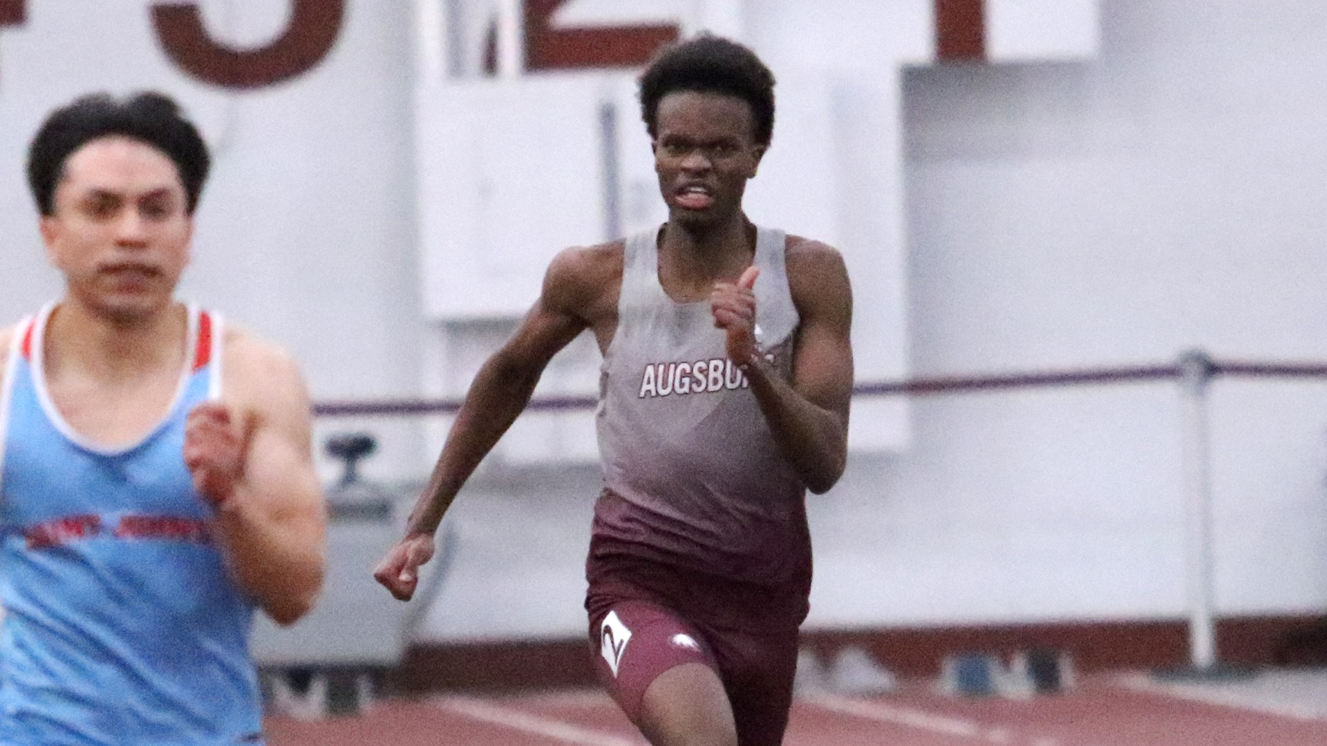 Evan Bitengo runs during a 2025 Augsburg men's track and field meet.