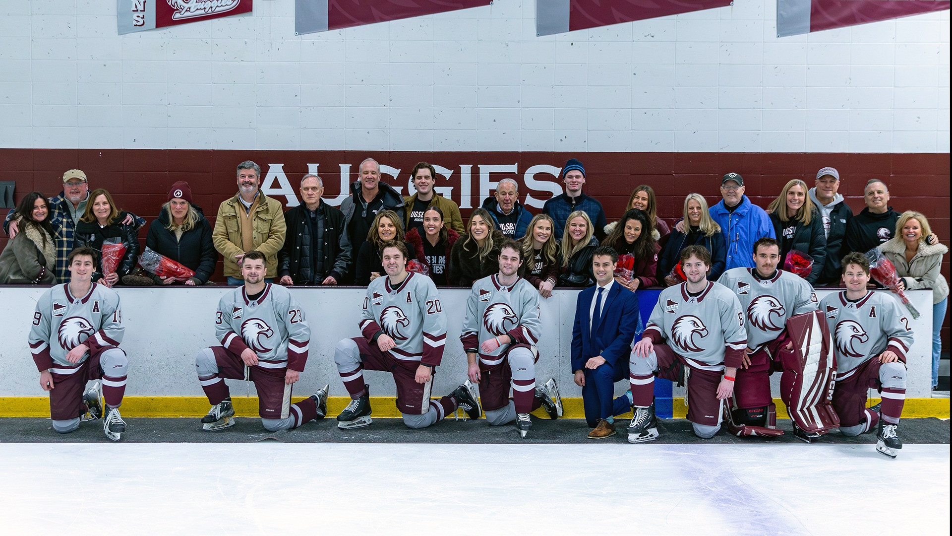 Augsburg men's hockey seniors pose for a photo before a 2025-26 game.