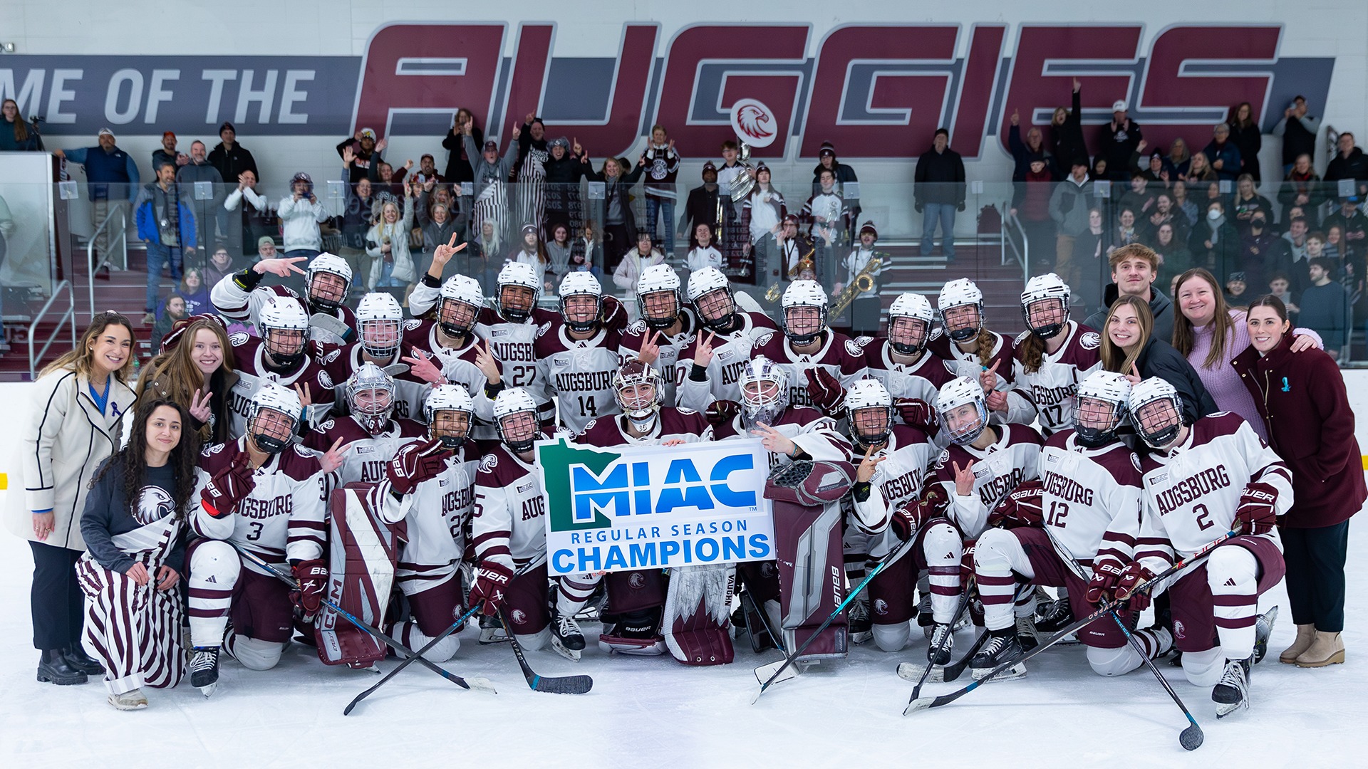 Augsburg women's hockey team poses for a group photo after winning the 2025-26 MIAC regular-season title.