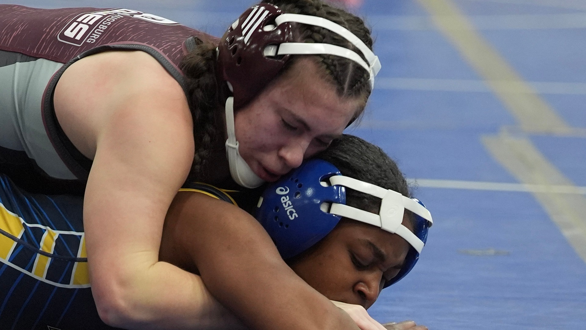 Alaina Franco has control of an opponent during a 2025-26 Augsburg women's wrestling meet.