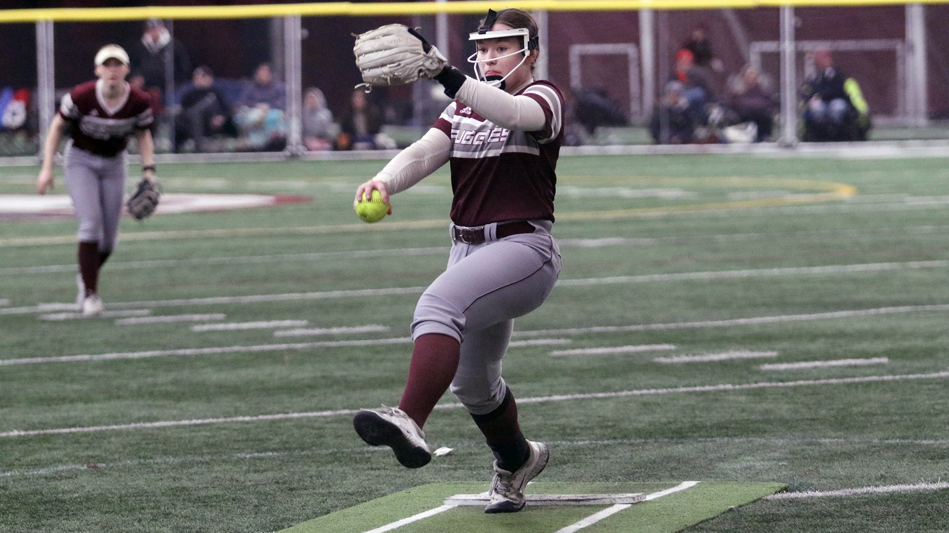 Nikolina Opp pitches during a 2026 Augsburg softball game.