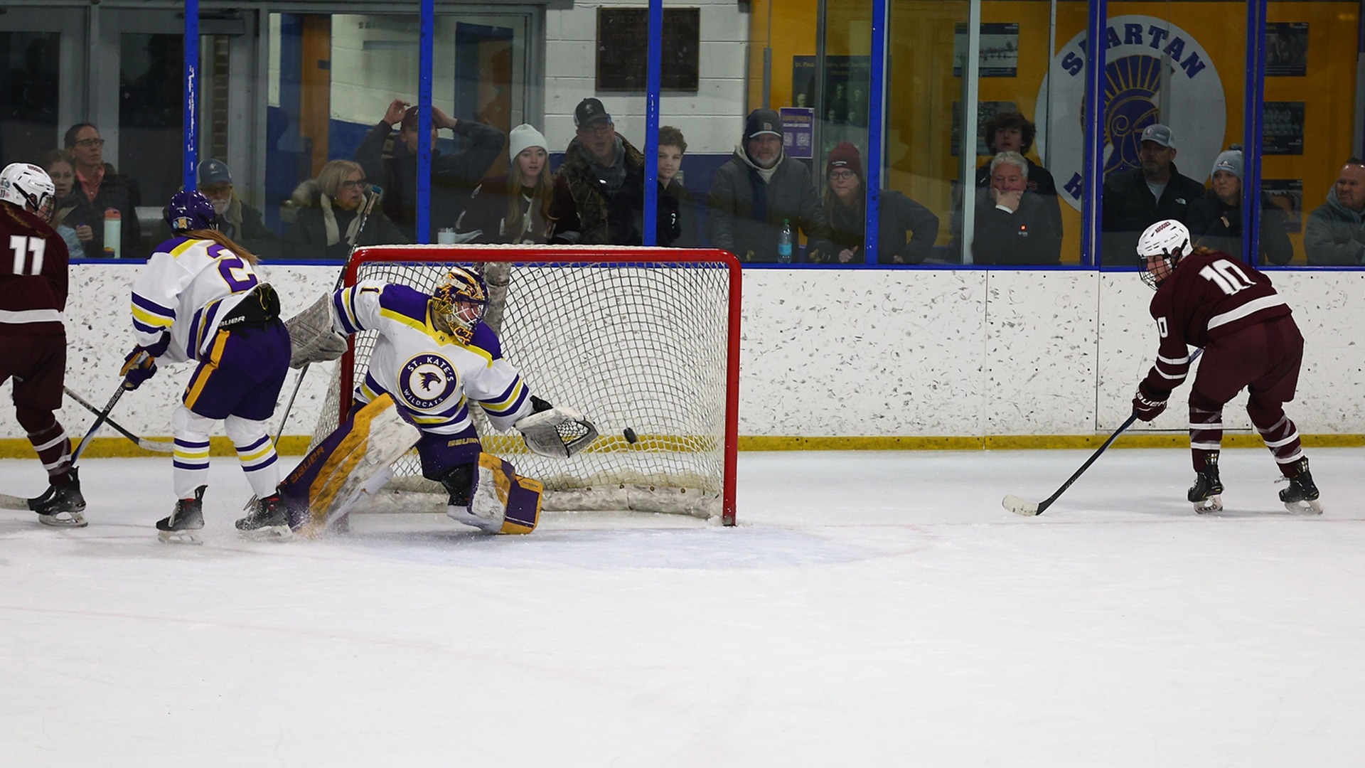 Jenna Allen scores a goal during a 2025-26 Augsburg women's hockey game.