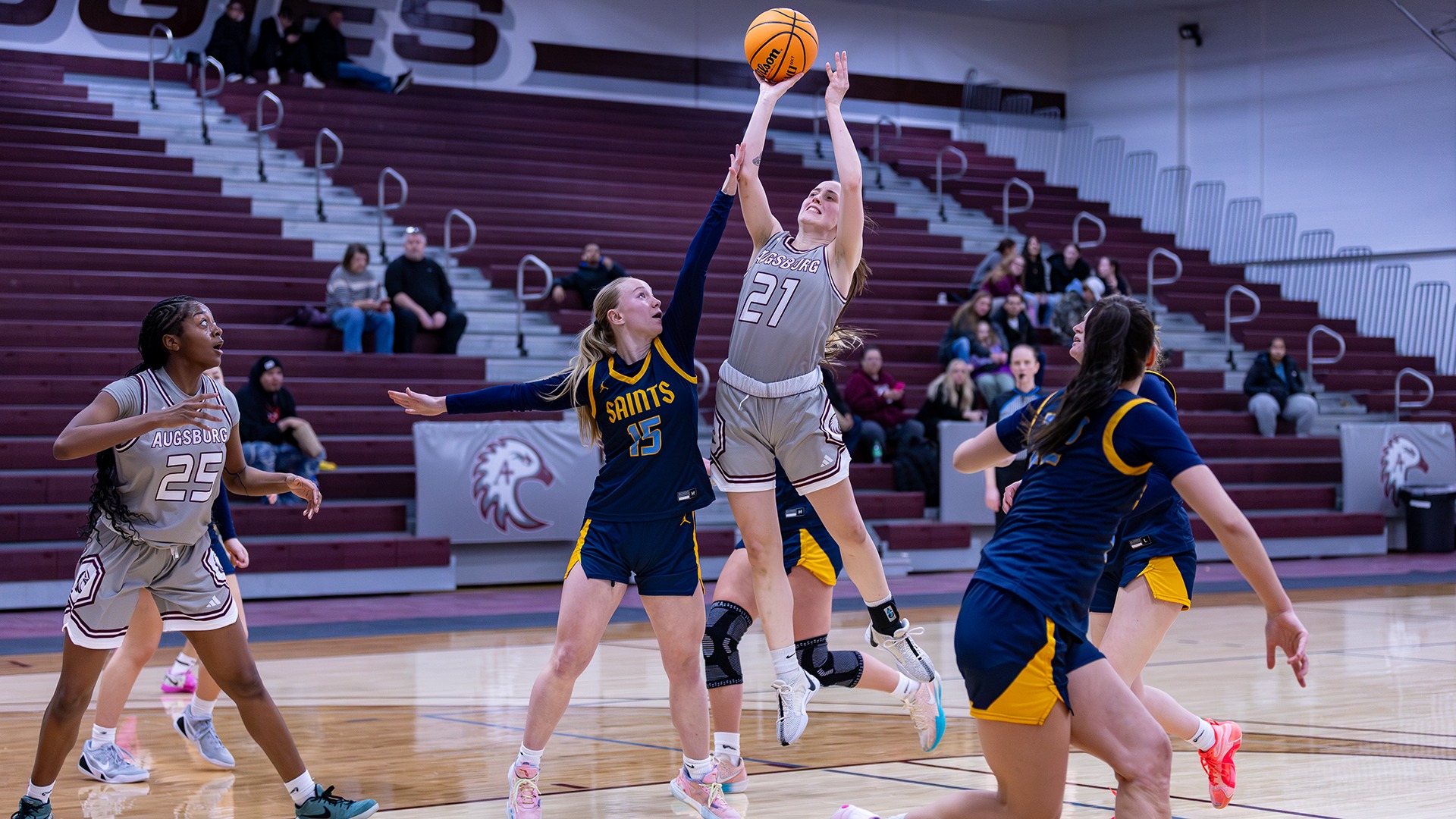 Sydney Hazuga puts up a shot during a 2025-26 Augsburg women's basketball game.