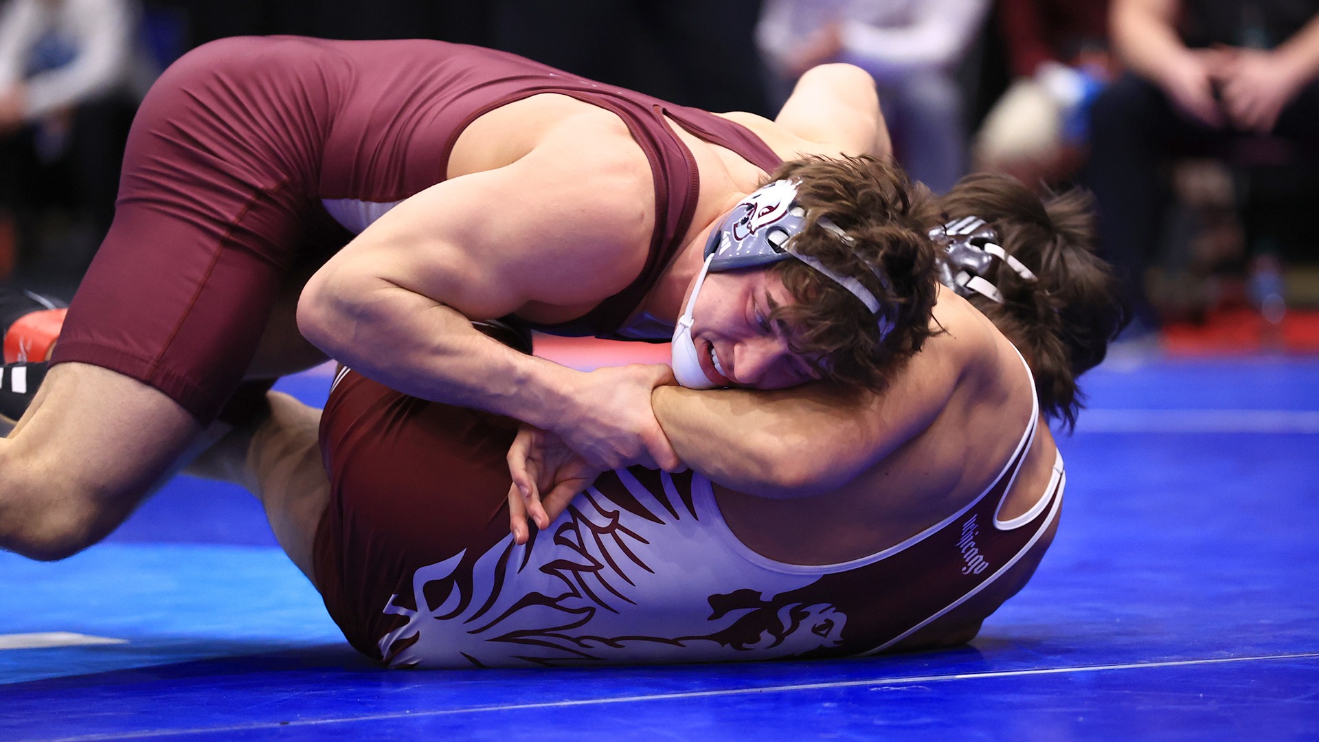 Ethan Winkelman has an opponent in a near-fall position during the 2026 NCAA Division III National Championships.