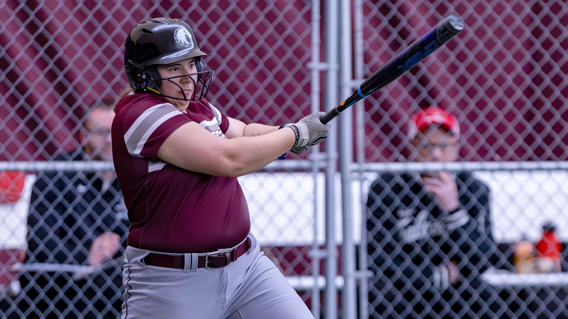 Jaime Olson swings at a pitch during a 2026 Augsburg softball game.