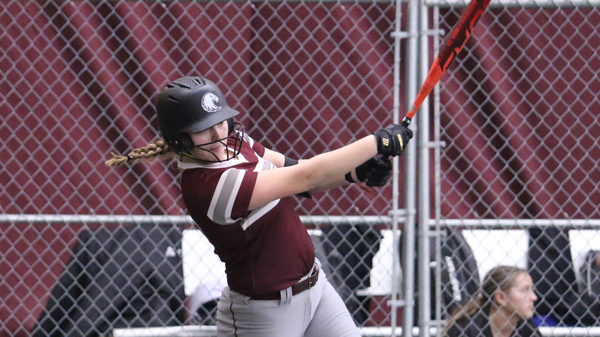 Kayla Shaffer swings at a pitch during a 2026 Augsburg softball game.