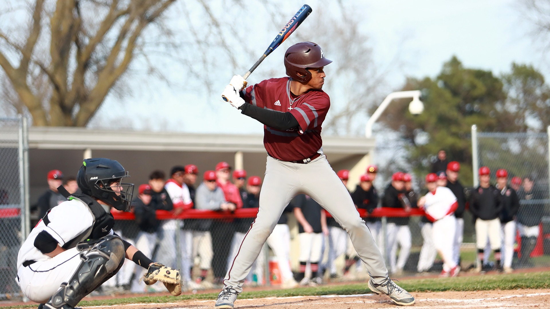 Aaron Jones gets set to swing at a pitch during a 2026 Augsburg baseball game.