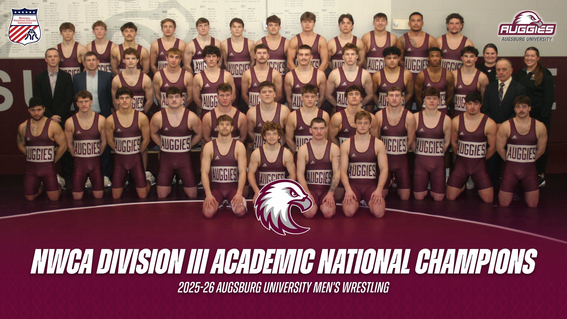 Augsburg's 2025-26 men's wrestling team photo. On the photo are the Augsburg logos and the NWCA logo, and the text: 
