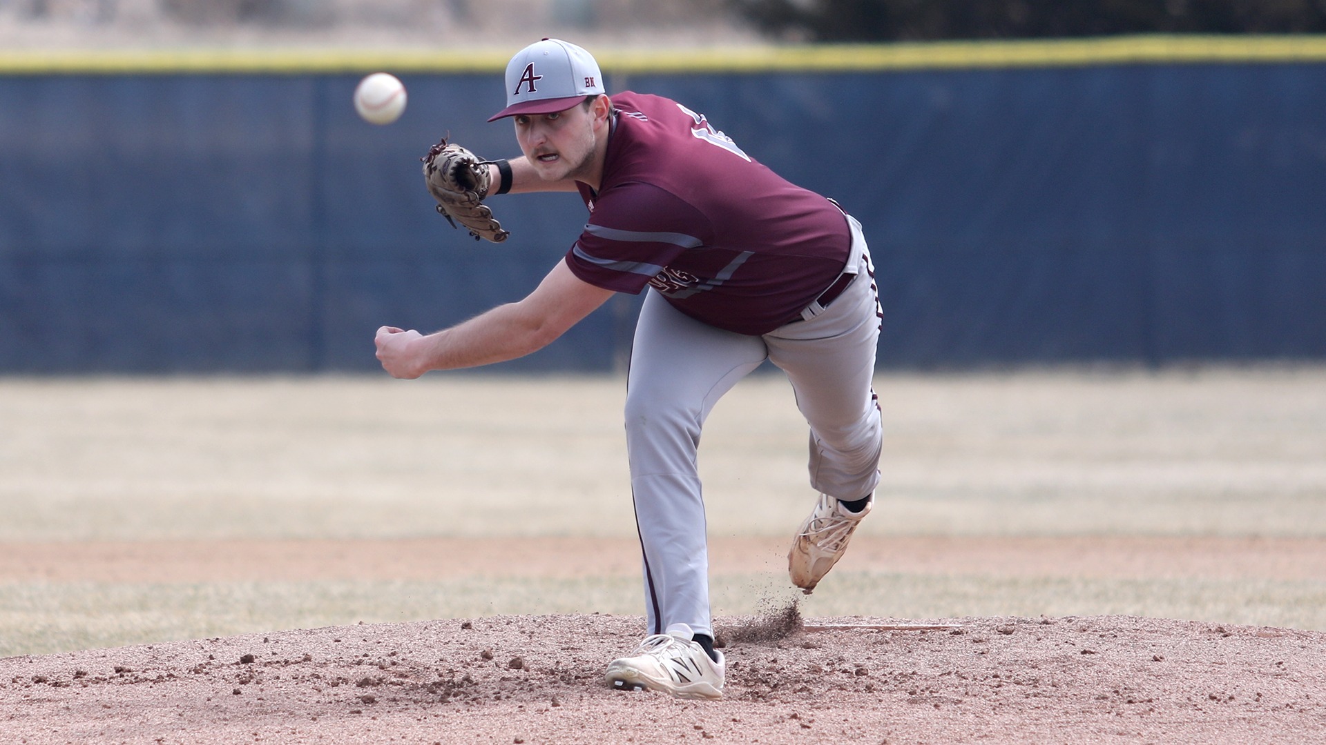 Austin Lang pitches during a 2026 Augsburg baseball game.