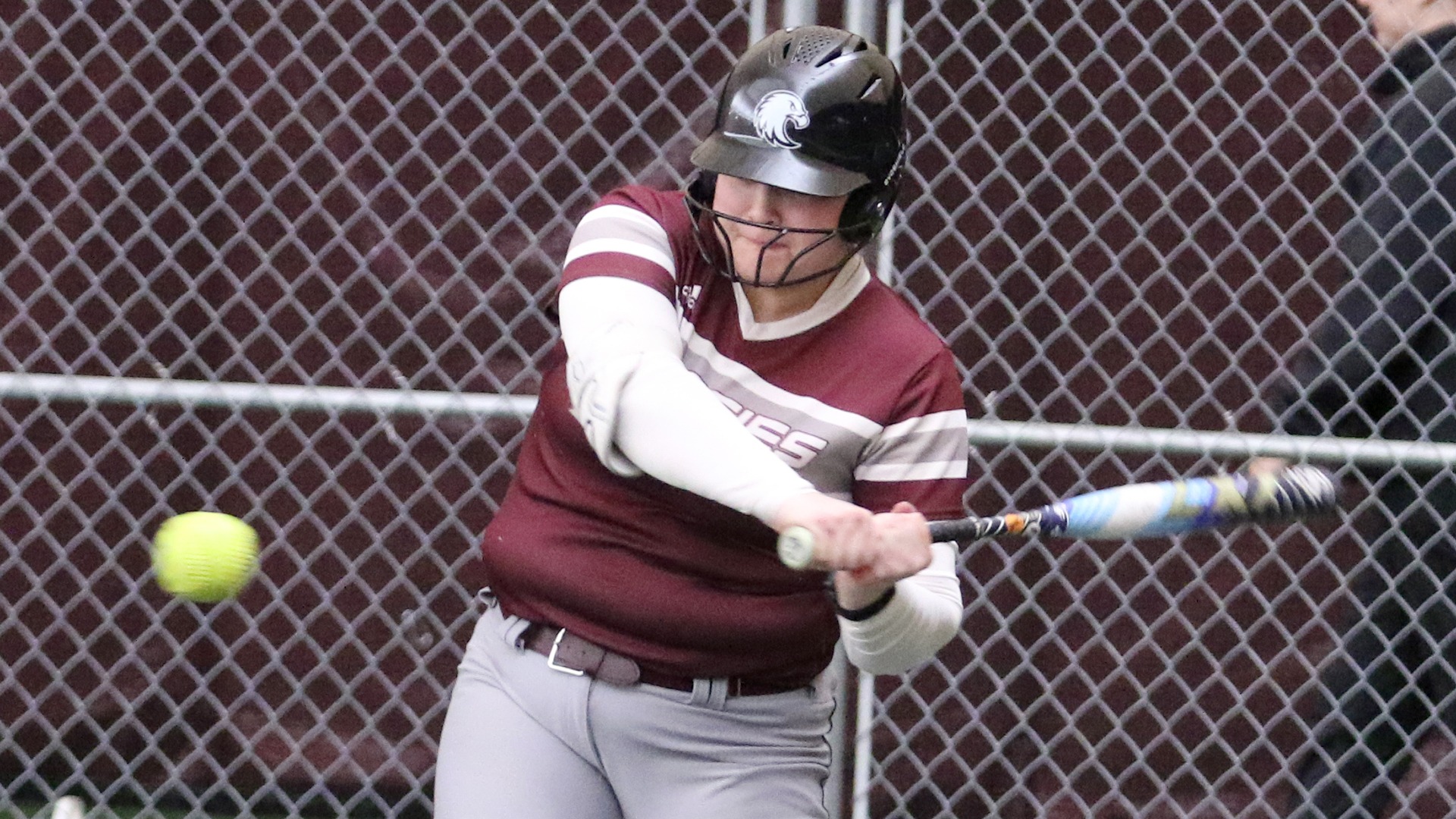 Lola Pilon swings at a pitch during a 2026 Augsburg softball game.