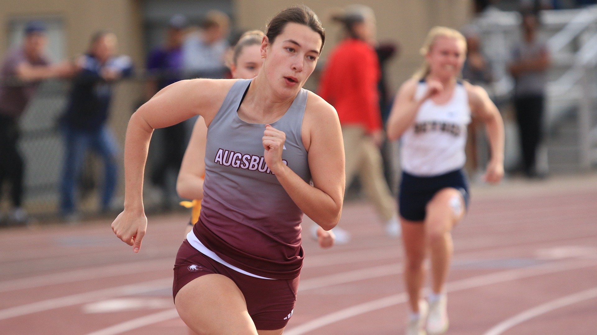 Allison Hookom sprints during a 2026 Augsburg women's track and field meet.