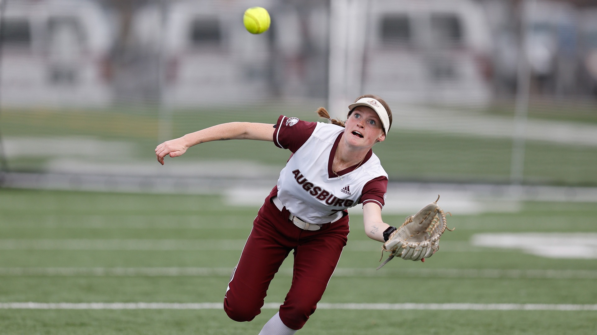 Teron Ormond-Miller pursues a fly ball during a 2026 Augsburg softball game.
