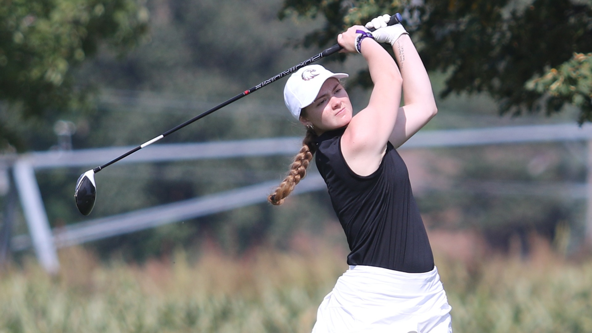 Marissa Paaske tees off during a 2025-26 Augsburg women's golf meet.