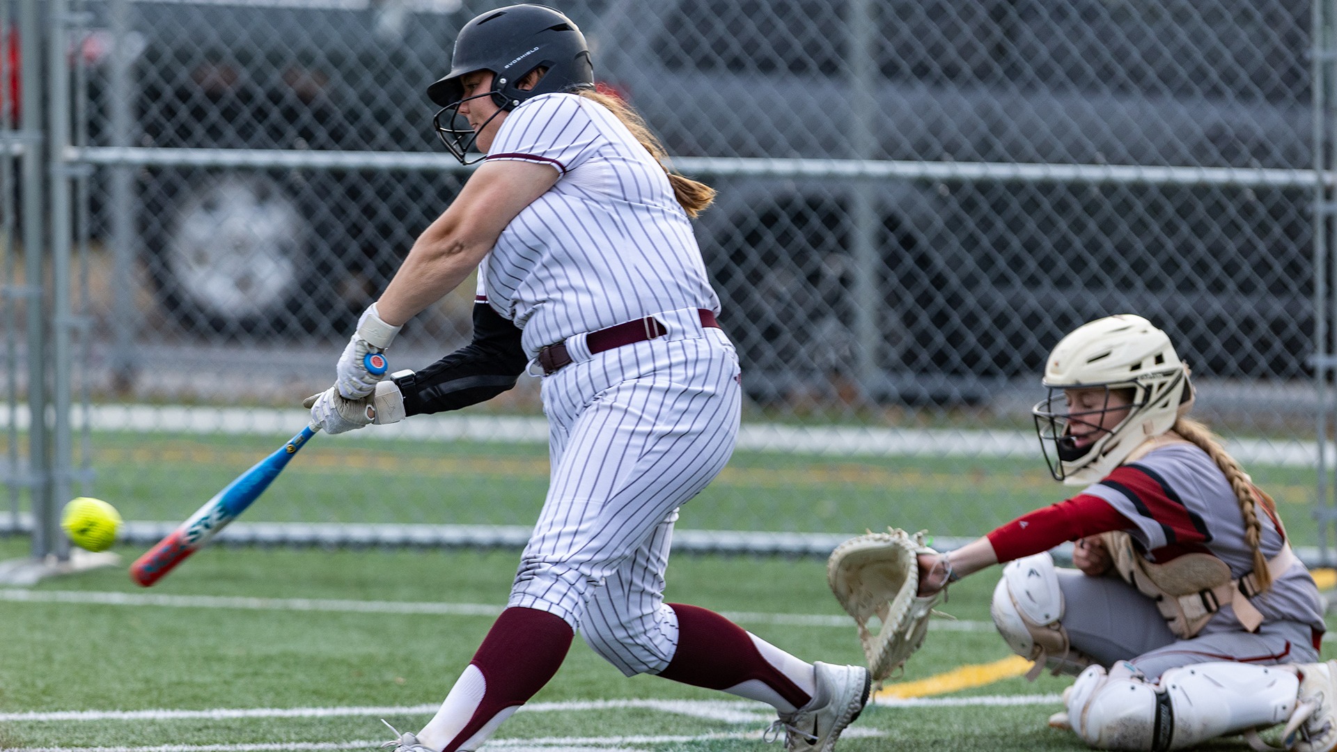 Mckenna Haug swings at a pitch during a 2026 Augsburg softball game.