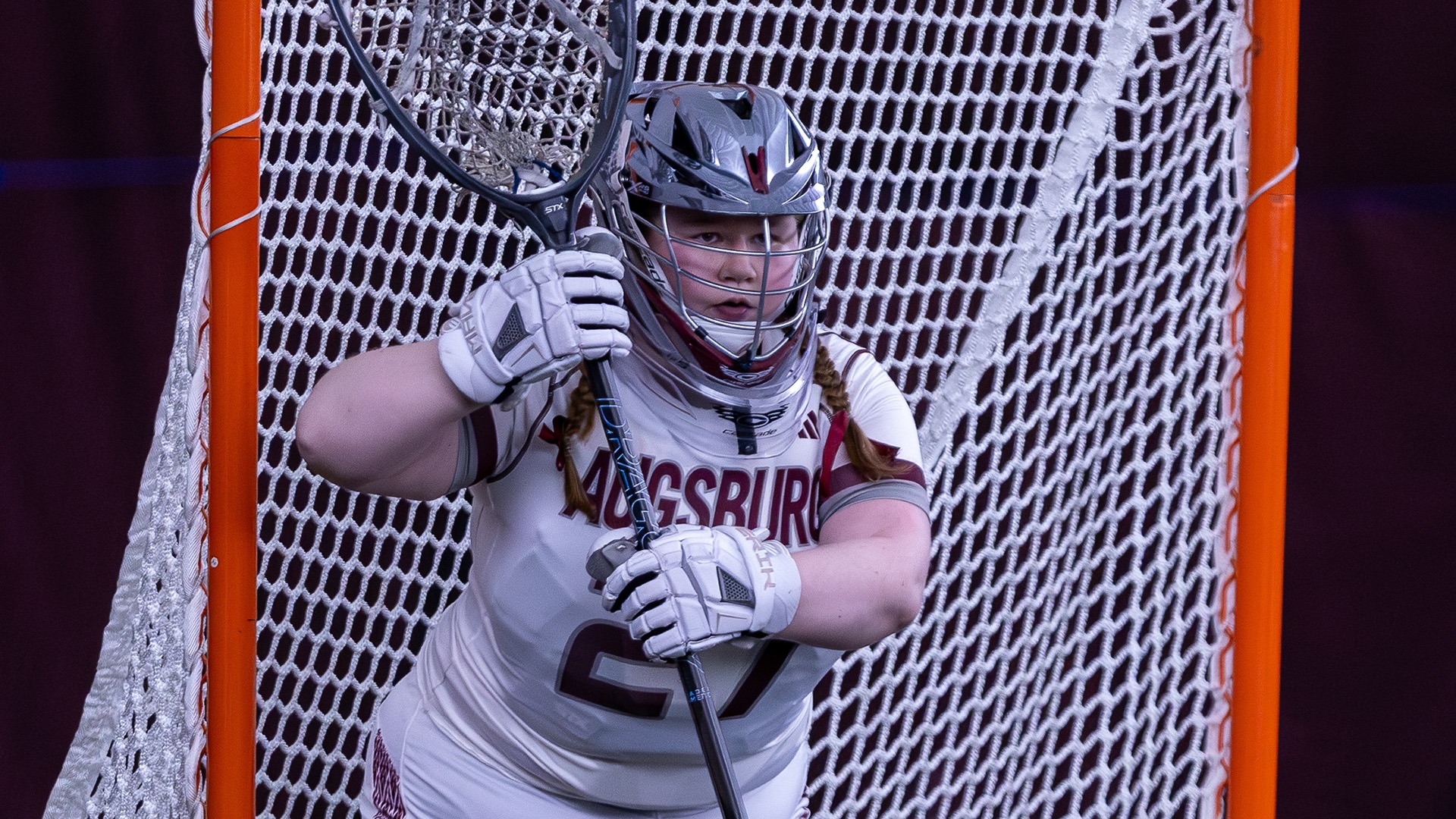 Nicole Schuster faces the action during a 2026 Augsburg women's lacrosse game.