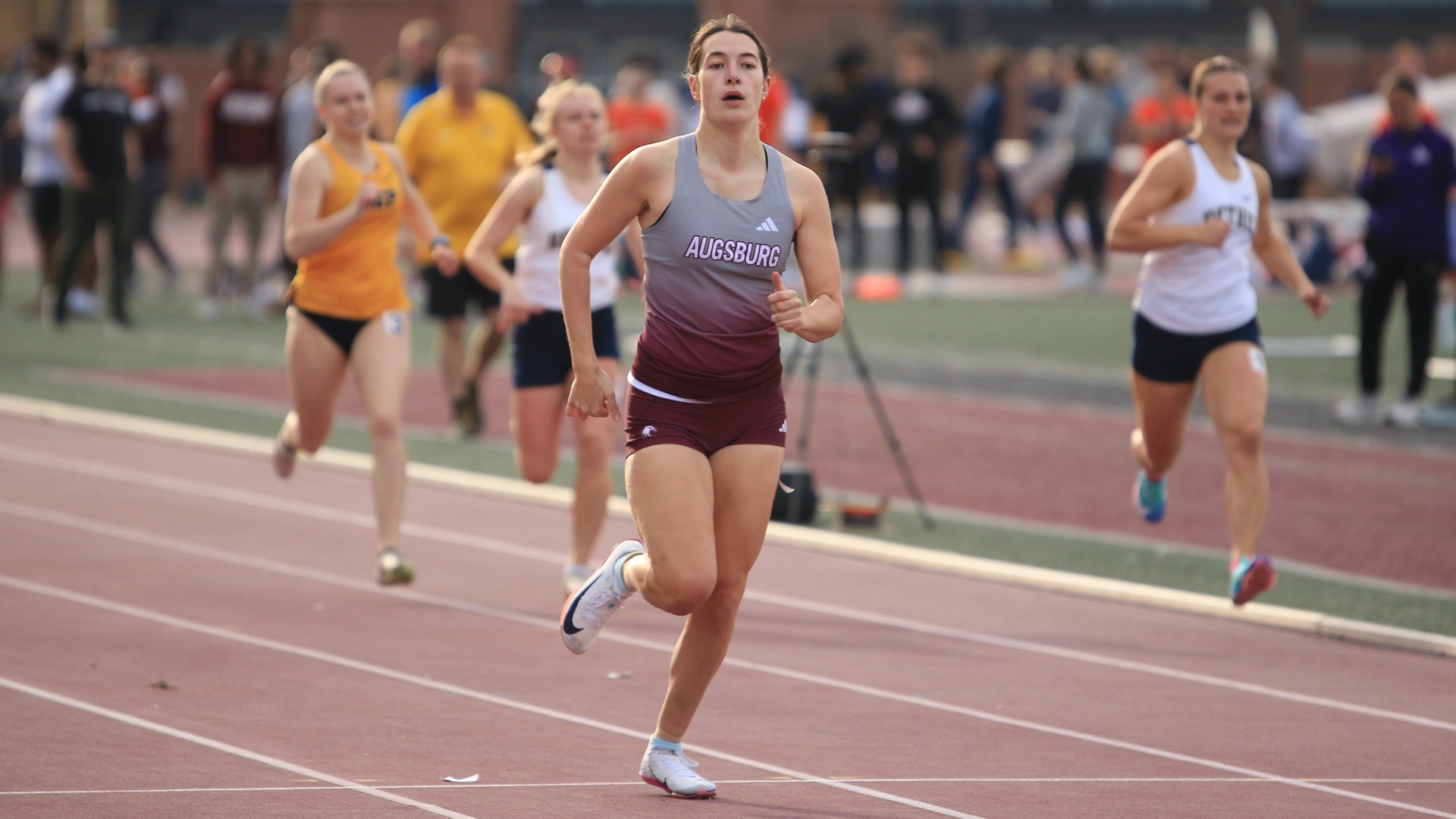 Allison Hookom runs during a 2026 Augsburg track and field meet.