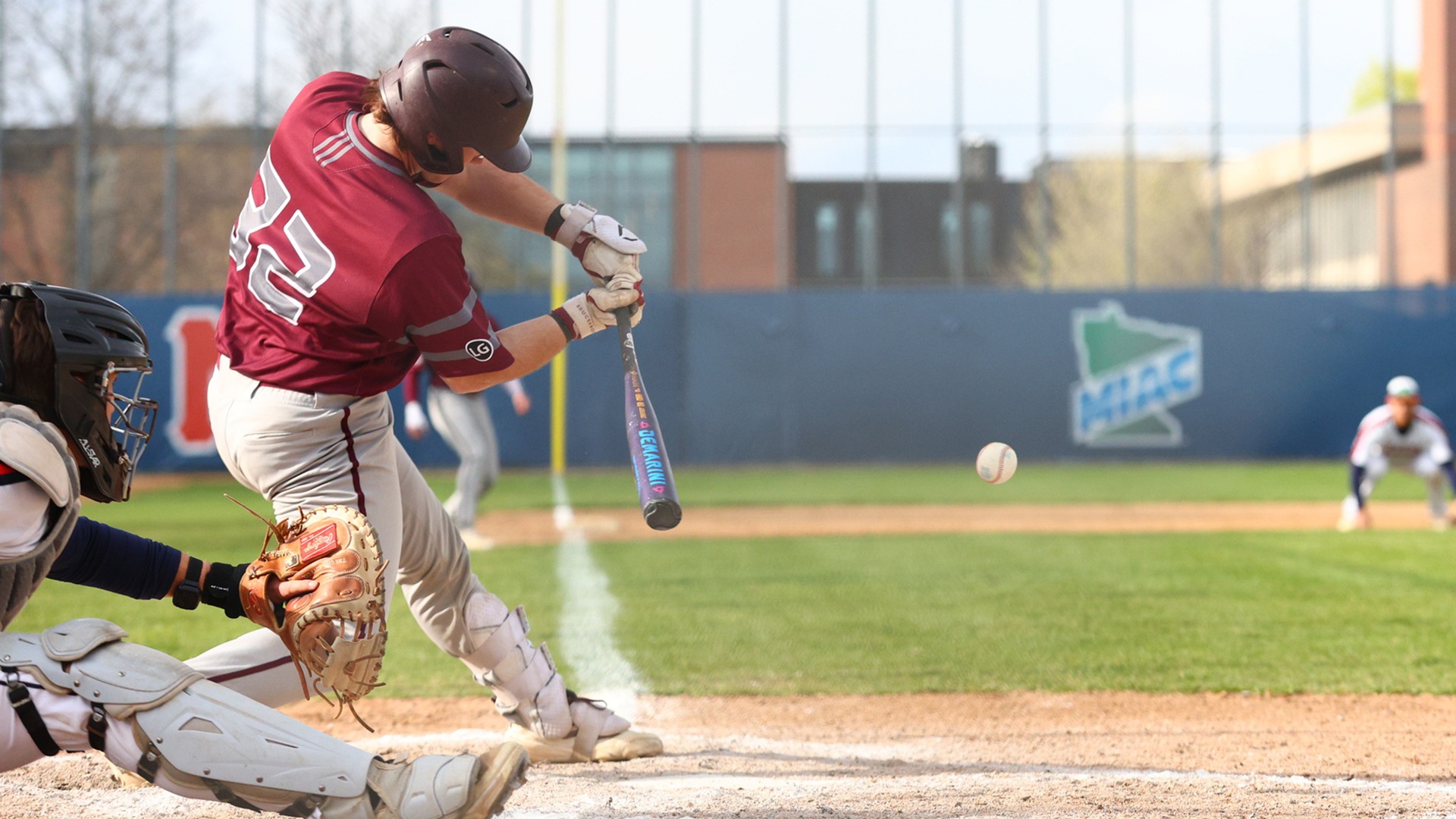 Michael Monson swings at a pitch during a 2026 Augsburg baseball game.