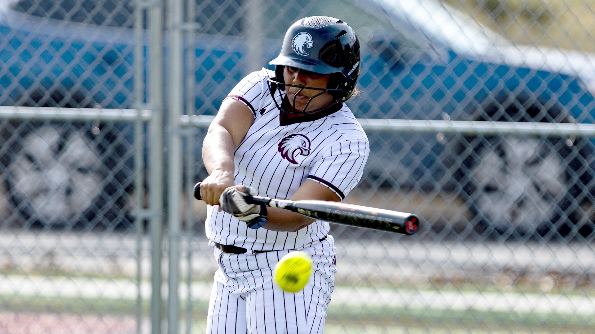 Jayden Evenson hits the ball during a 2026 Augsburg softball game.