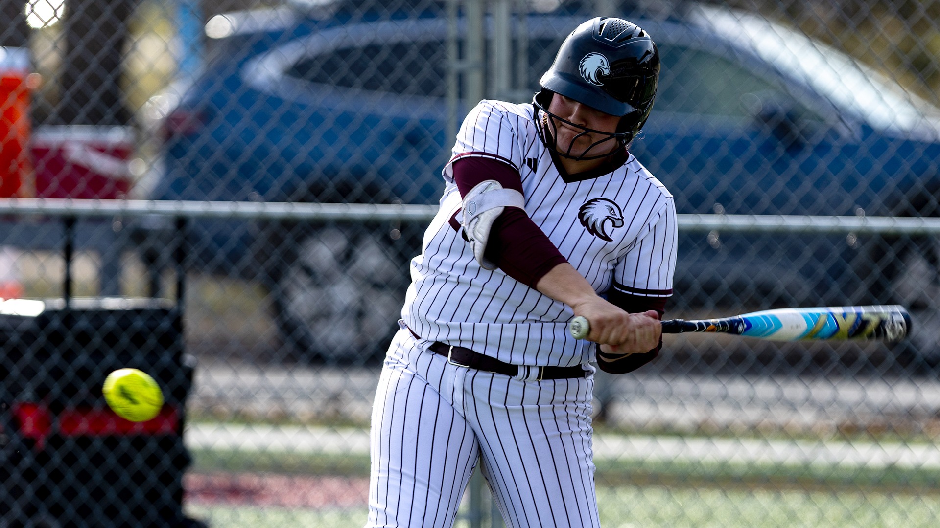 Lola Pilon swings at a pitch during a 2026 Augsburg softball game.