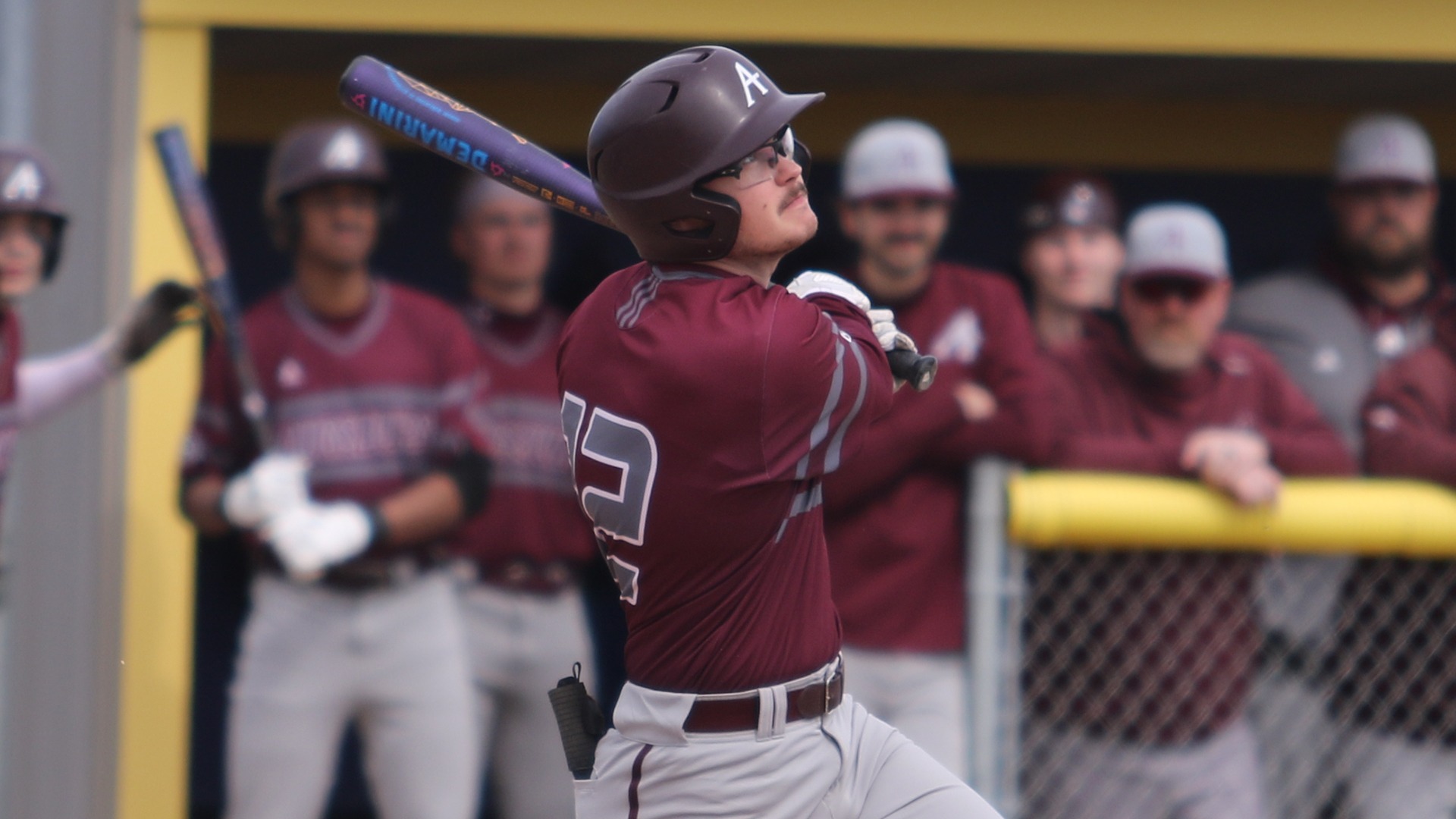 Drew Jenkins swings at a pitch during a 2026 Augsburg softball game.