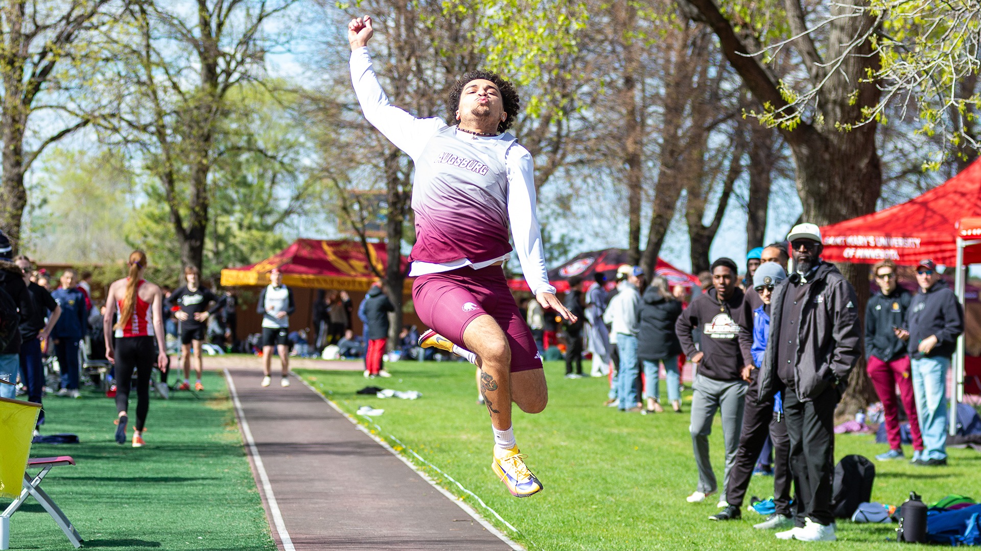 D'Vante McElroy competes in a jumping event during a 2026 Augsburg men's track and field meet.