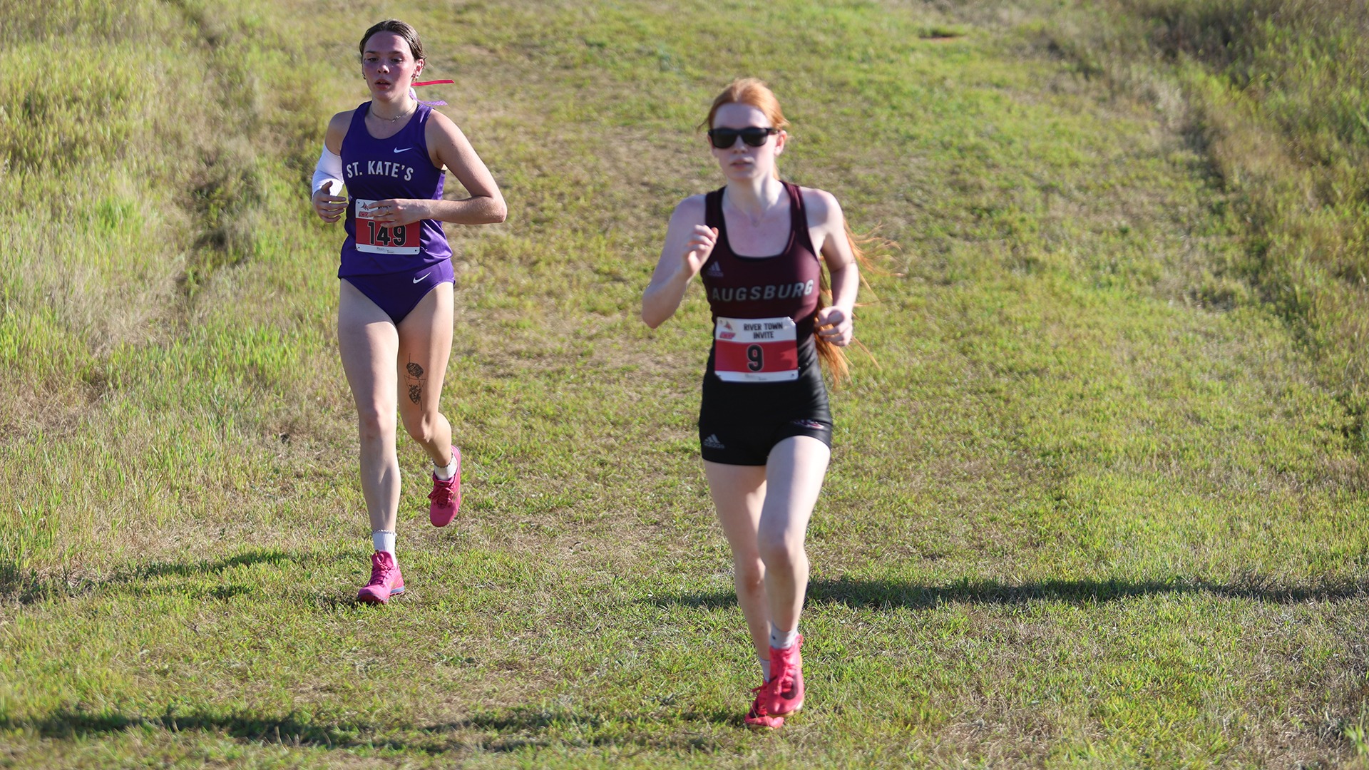 Macayla Graham runs during a 2026 Augsburg cross country meet.
