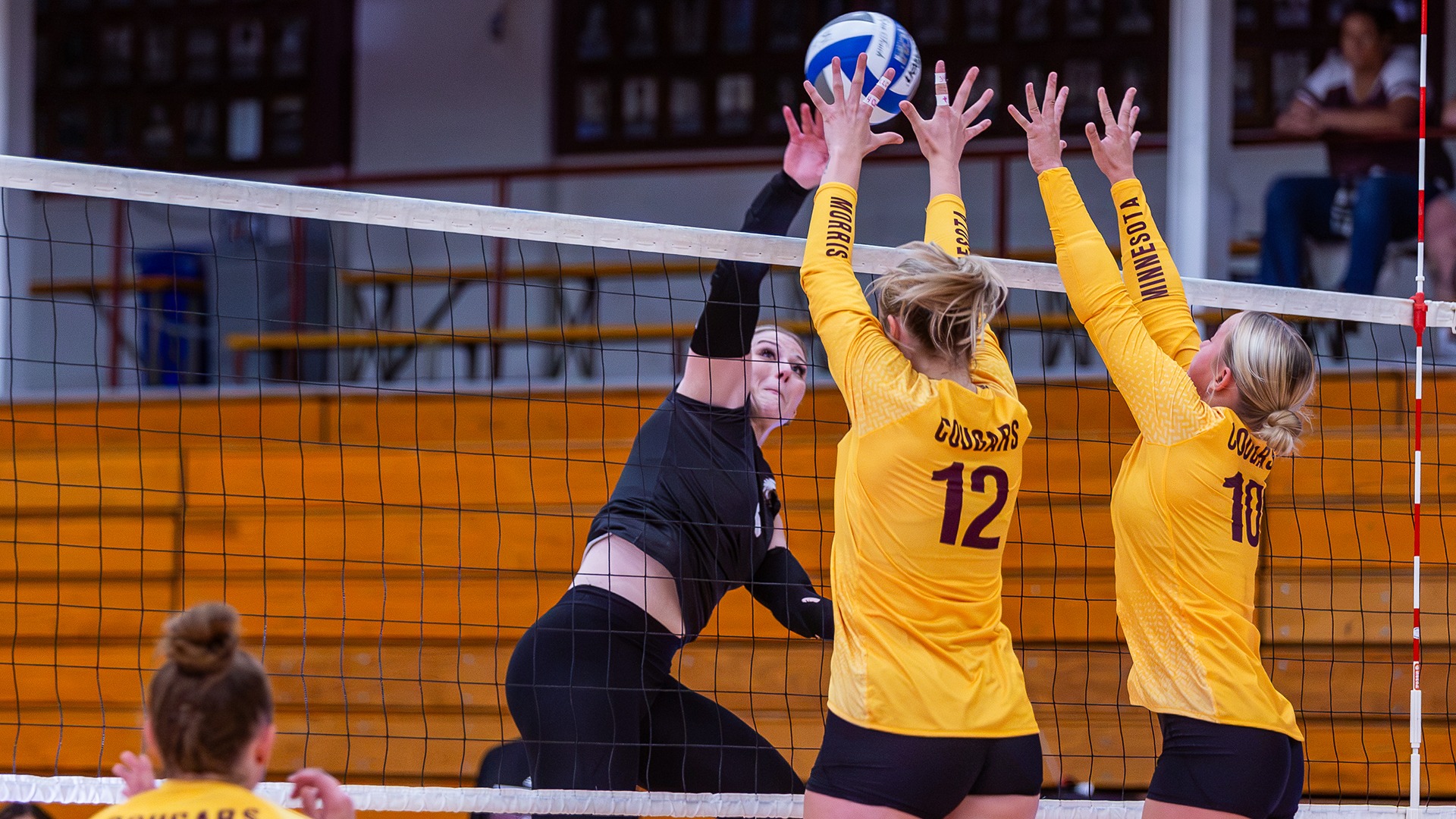 Taliah Triggs plays the ball off a block during a 2026 Augsburg volleyball match.