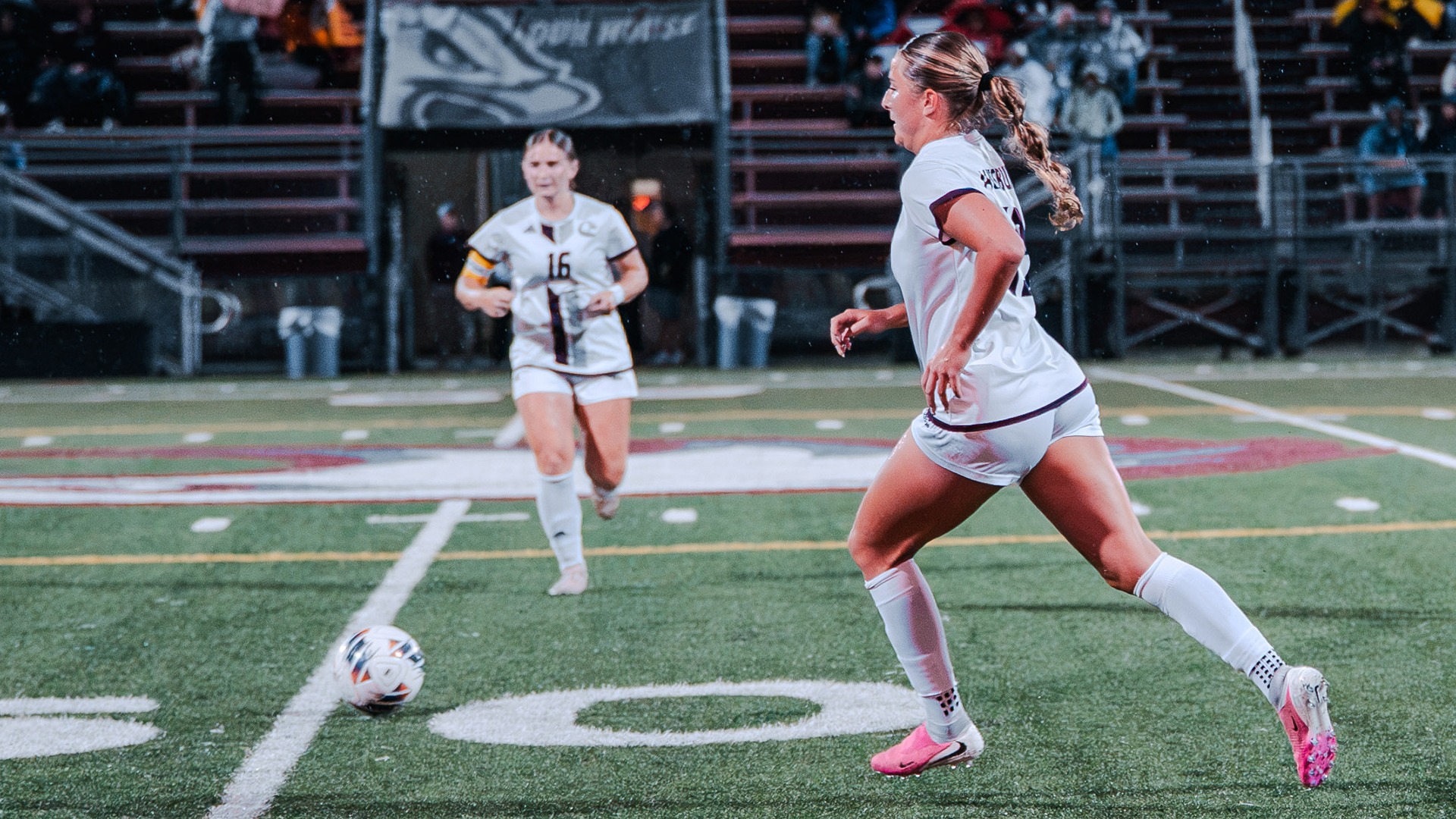 Piper Schmidt works the ball forward during a 2026 Augsburg women's soccer game.