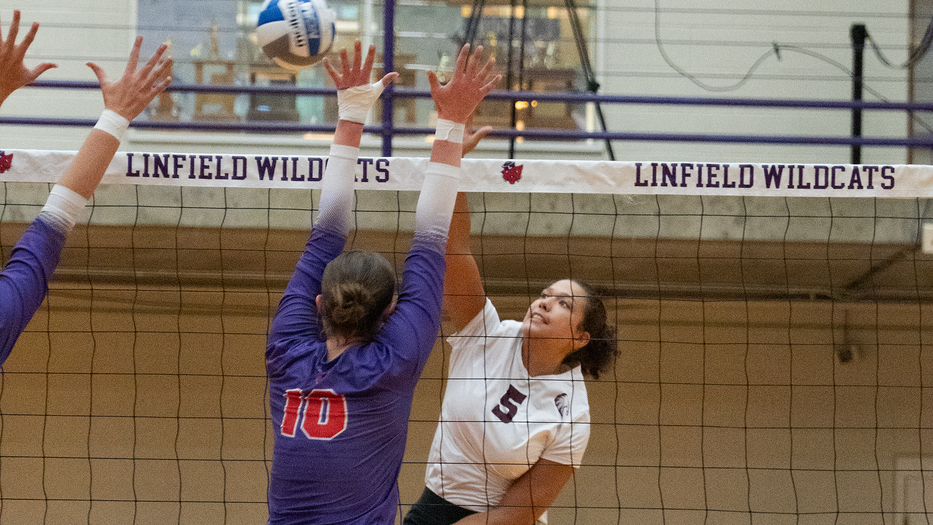 Marley Mitchell attacks the ball during a 2026 Augsburg volleyball match.