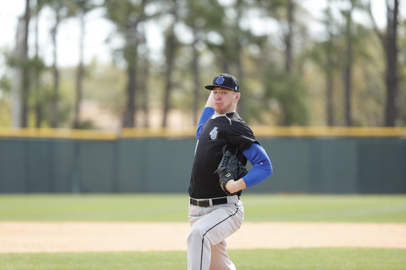 Roycroft and Turnquist spin Spartans to wins Aurora University Athletics