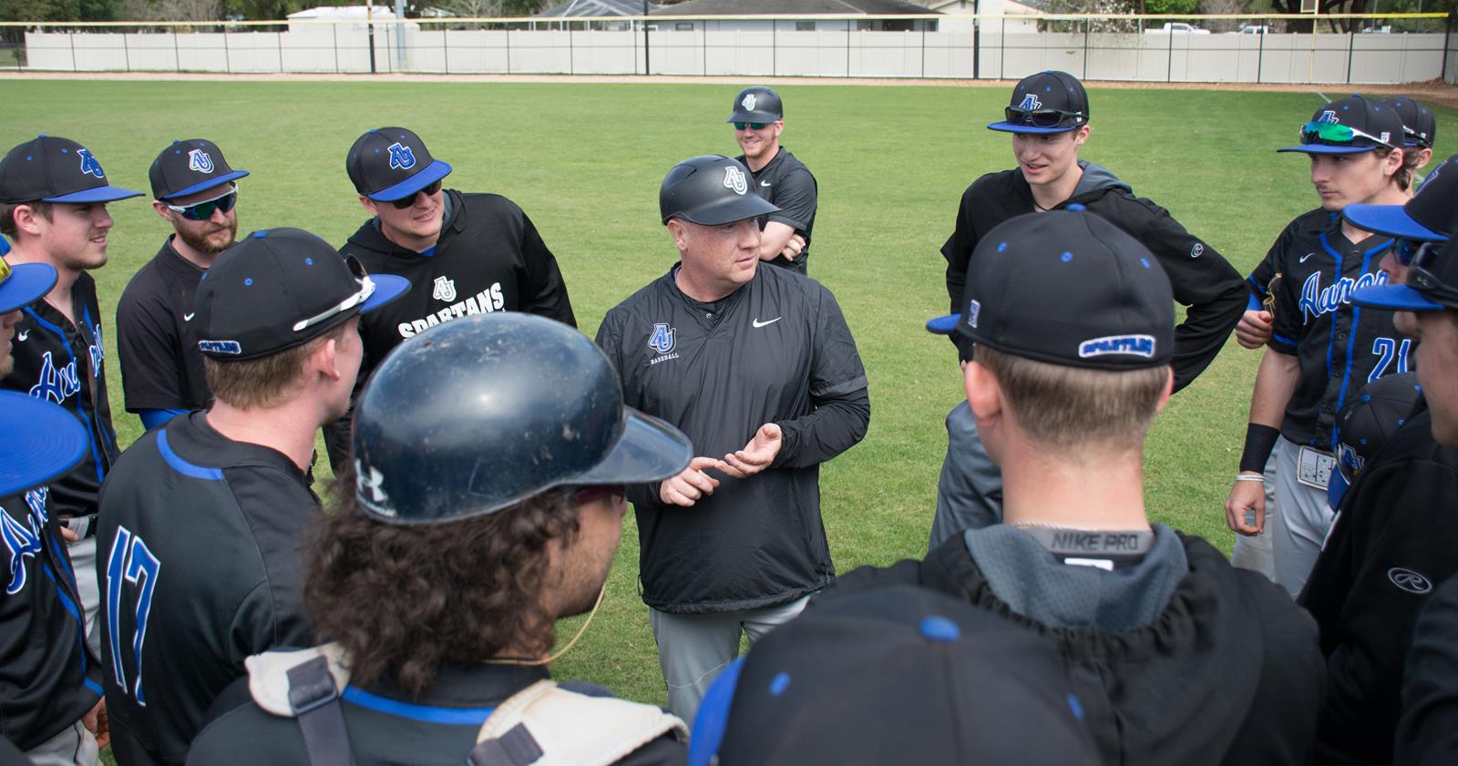 Adam Stevens talks to his team