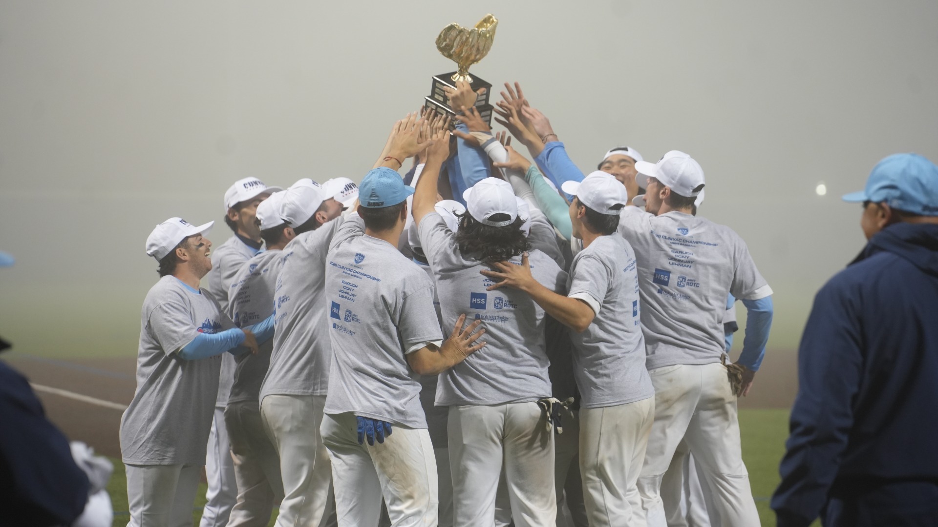 Baruch baseball hoist 2026 CUNYAC Championship Trophy after defeating CCNY in Championship series.