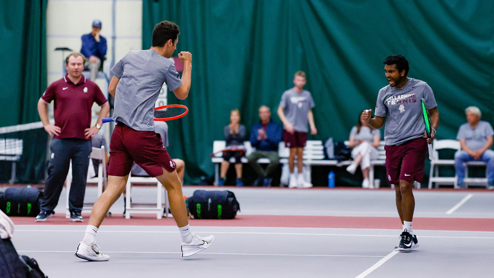 Matthew Nice and Vineet Ramesh fist pump after scoring a point together