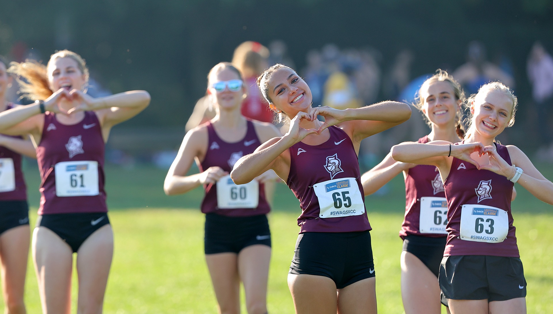 Women's cross country warms up before a meet this season.
