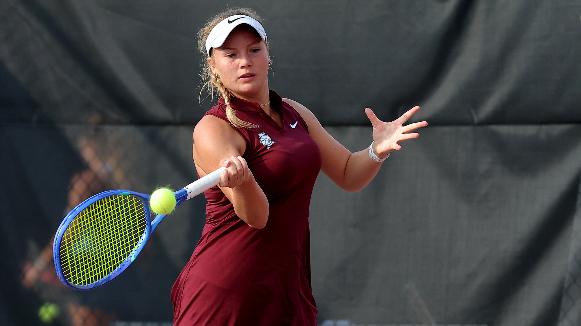 Reese Parker send a forehand return