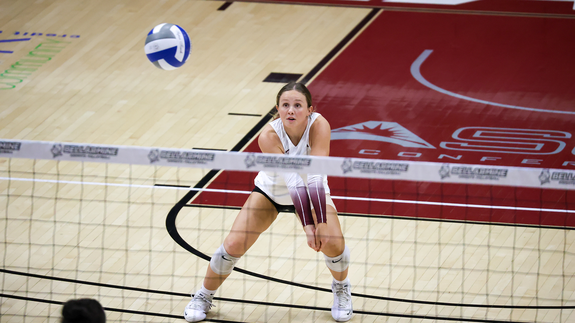 Tessa Nauert digs a ball from UCA