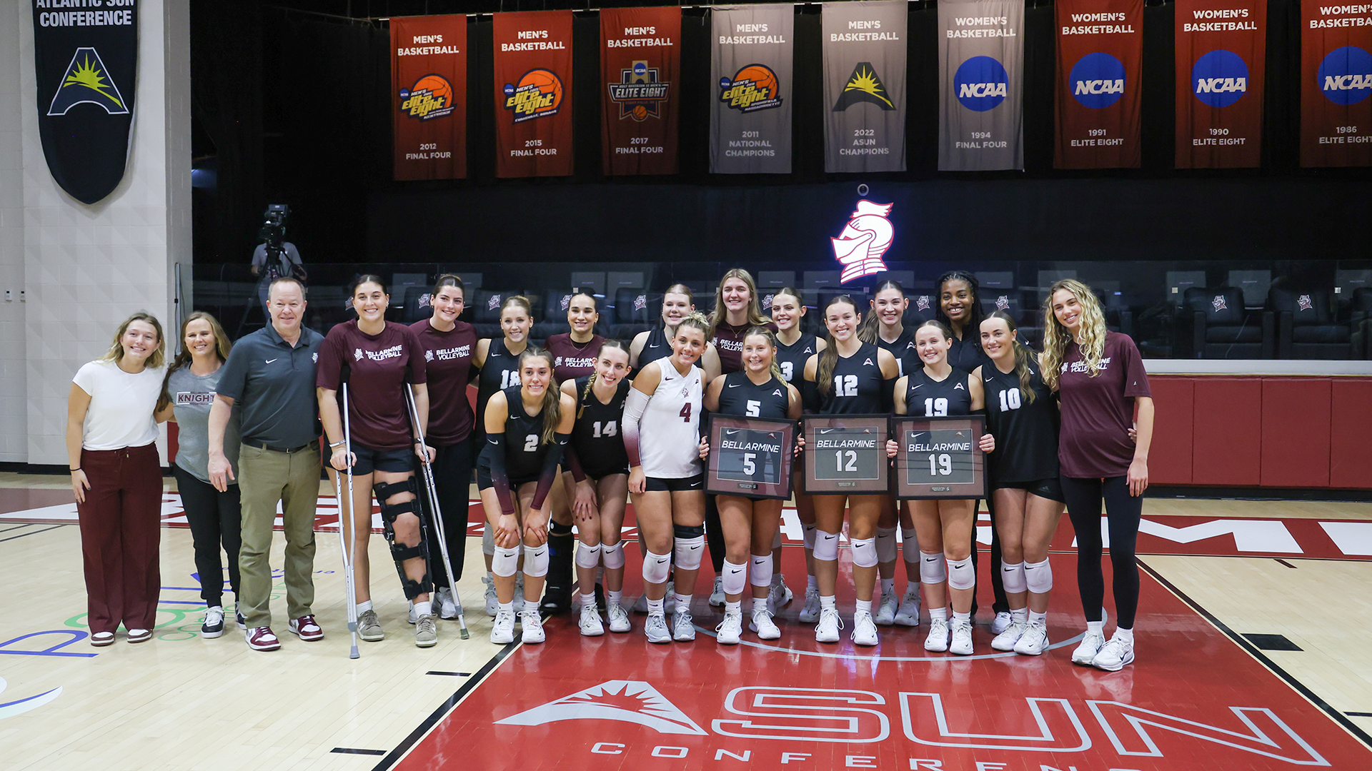 Volleyball team celebrating senior night