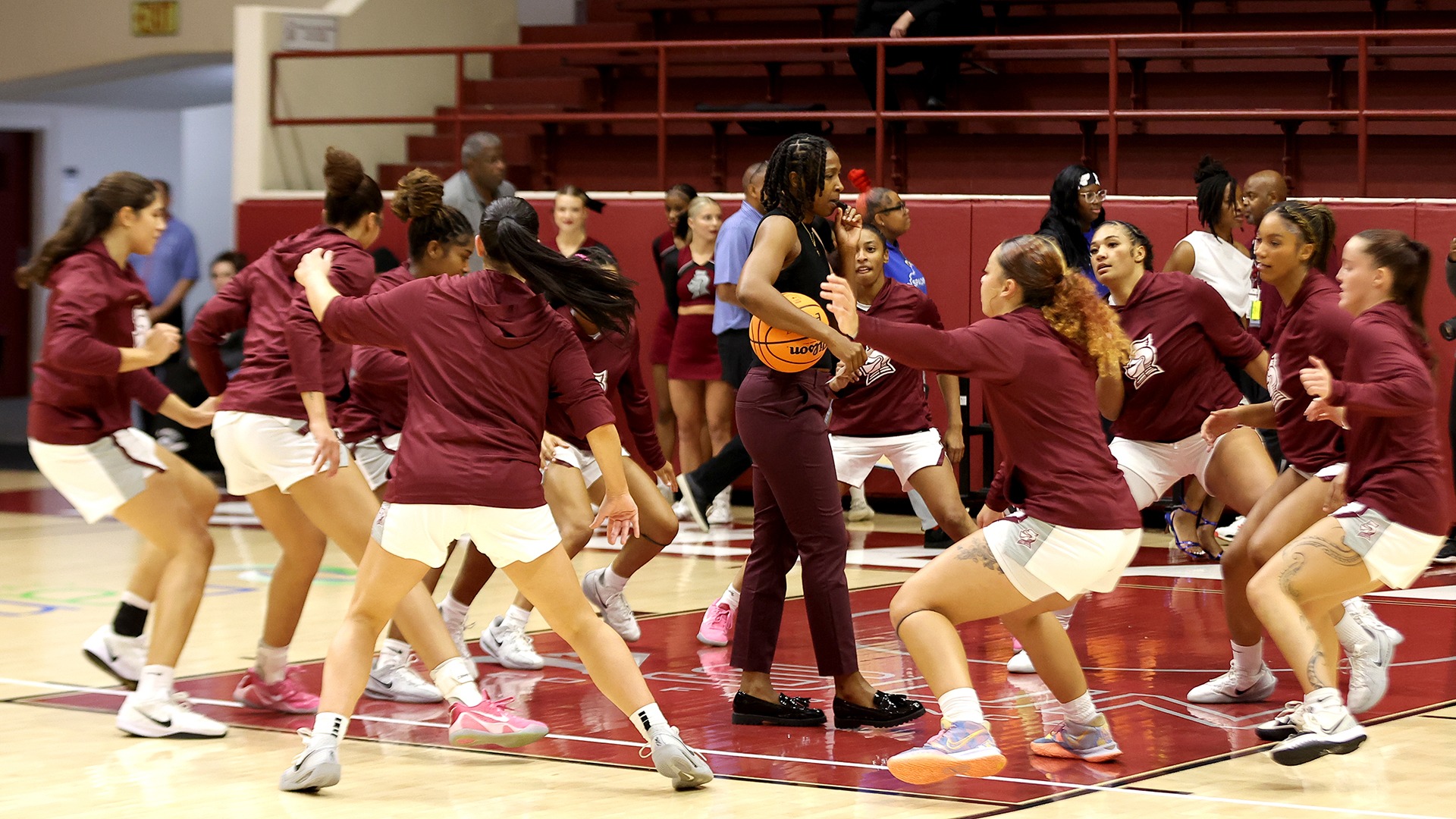 Bellarmine warms up before a game.