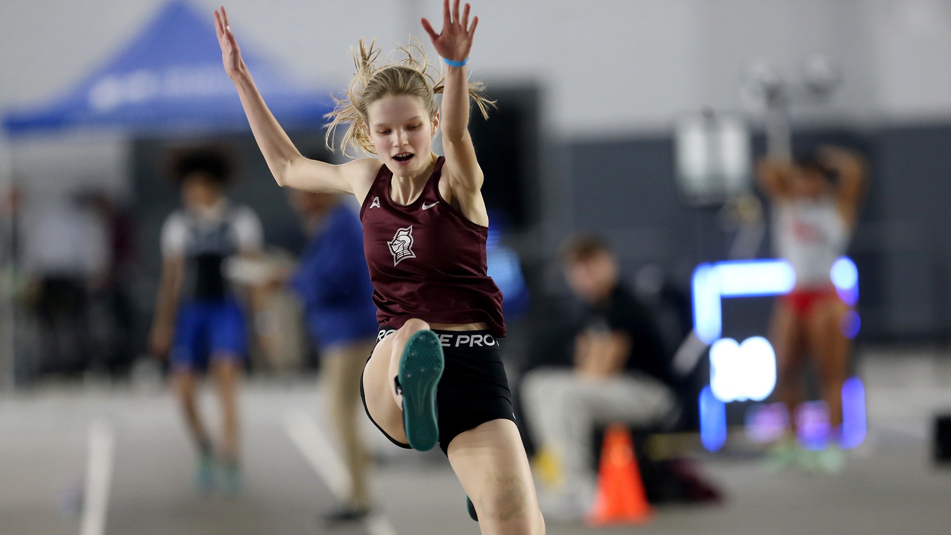 Amelia Svidal competes in the triple jump at the Bellarmine Open.