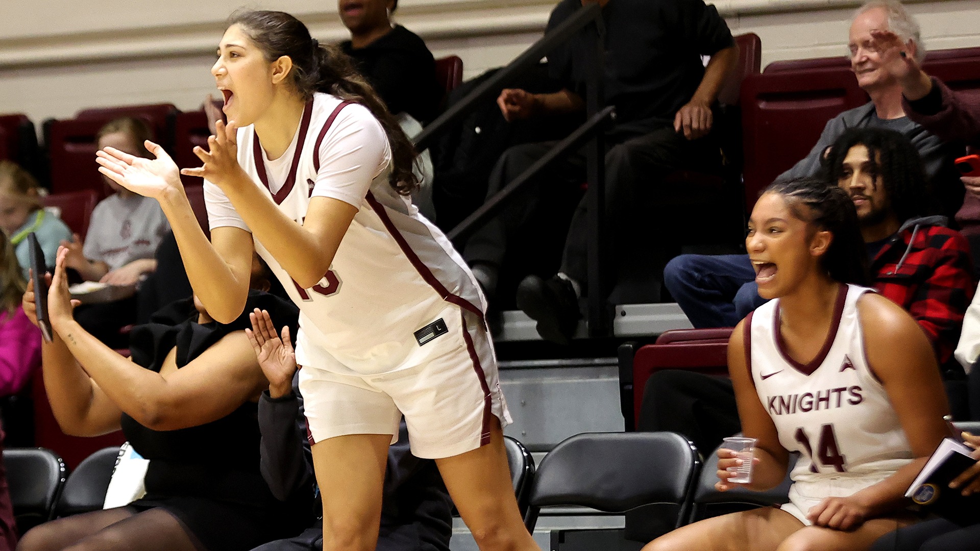 Haya Abdel Aal cheers for her teammates in a game this season.