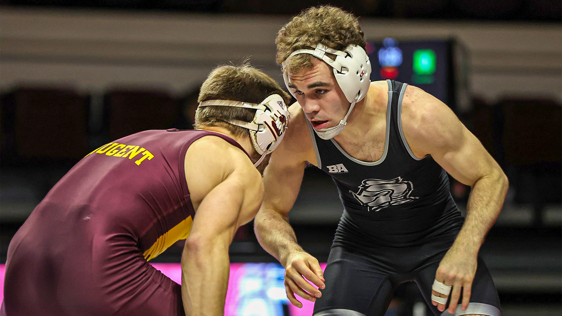 Zac Cowan eyes his opponent from Central Michigan
