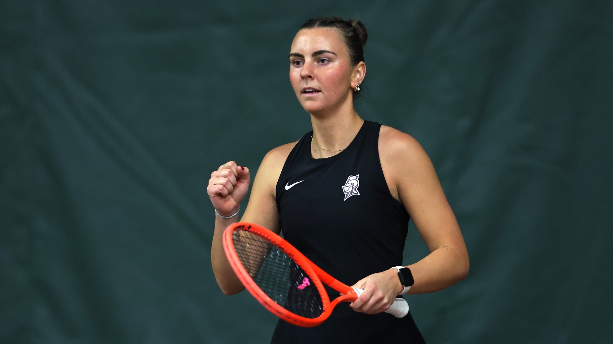 Lillie Willis fist pumps a point against Cumberlands
