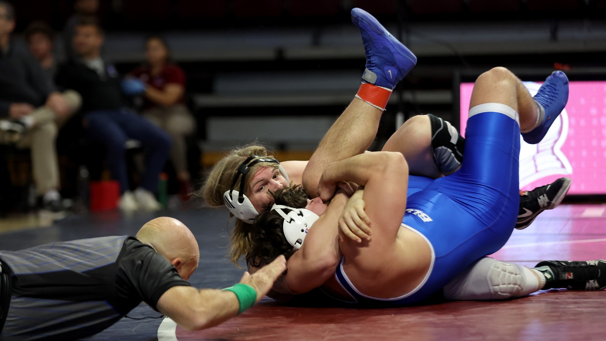 Daulton Mayer pins his opponent from Presbyterian