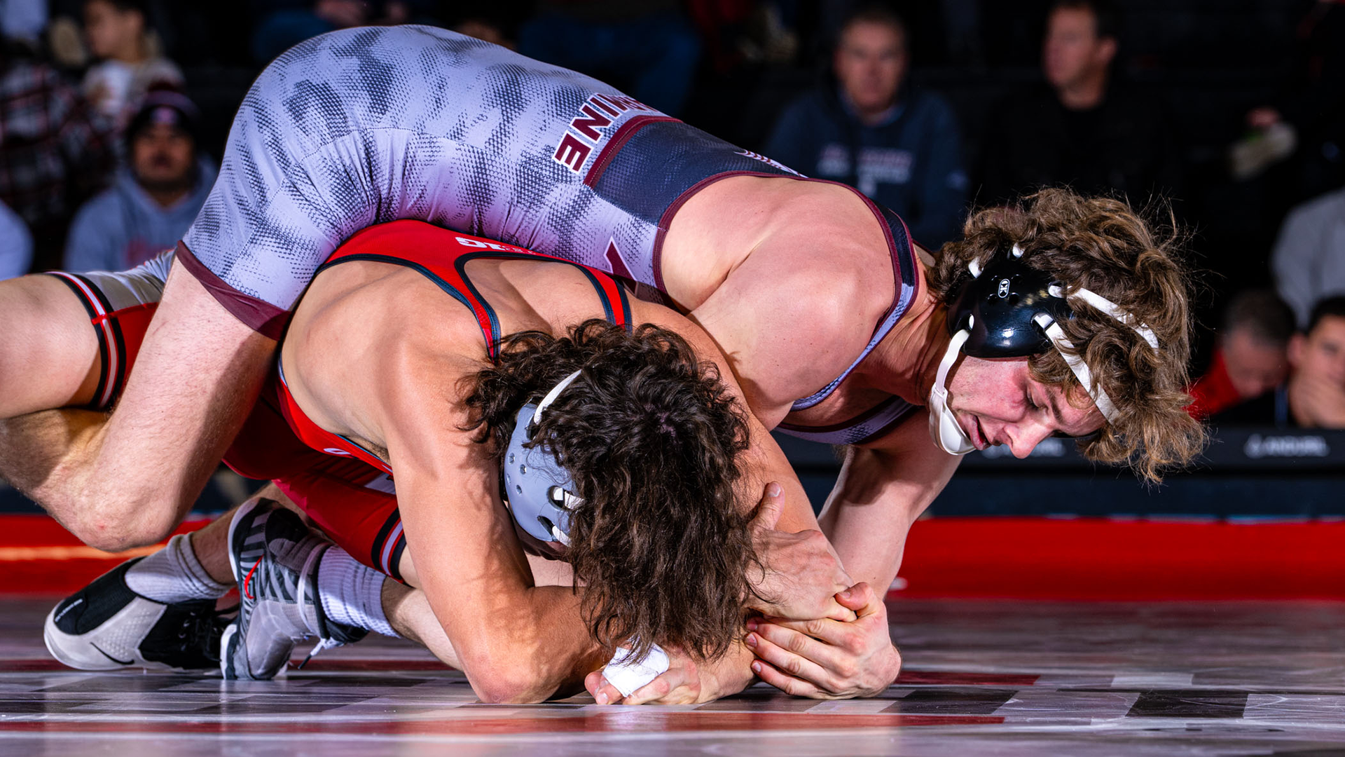 Jeb Prechtel rides his opponent from Ohio State