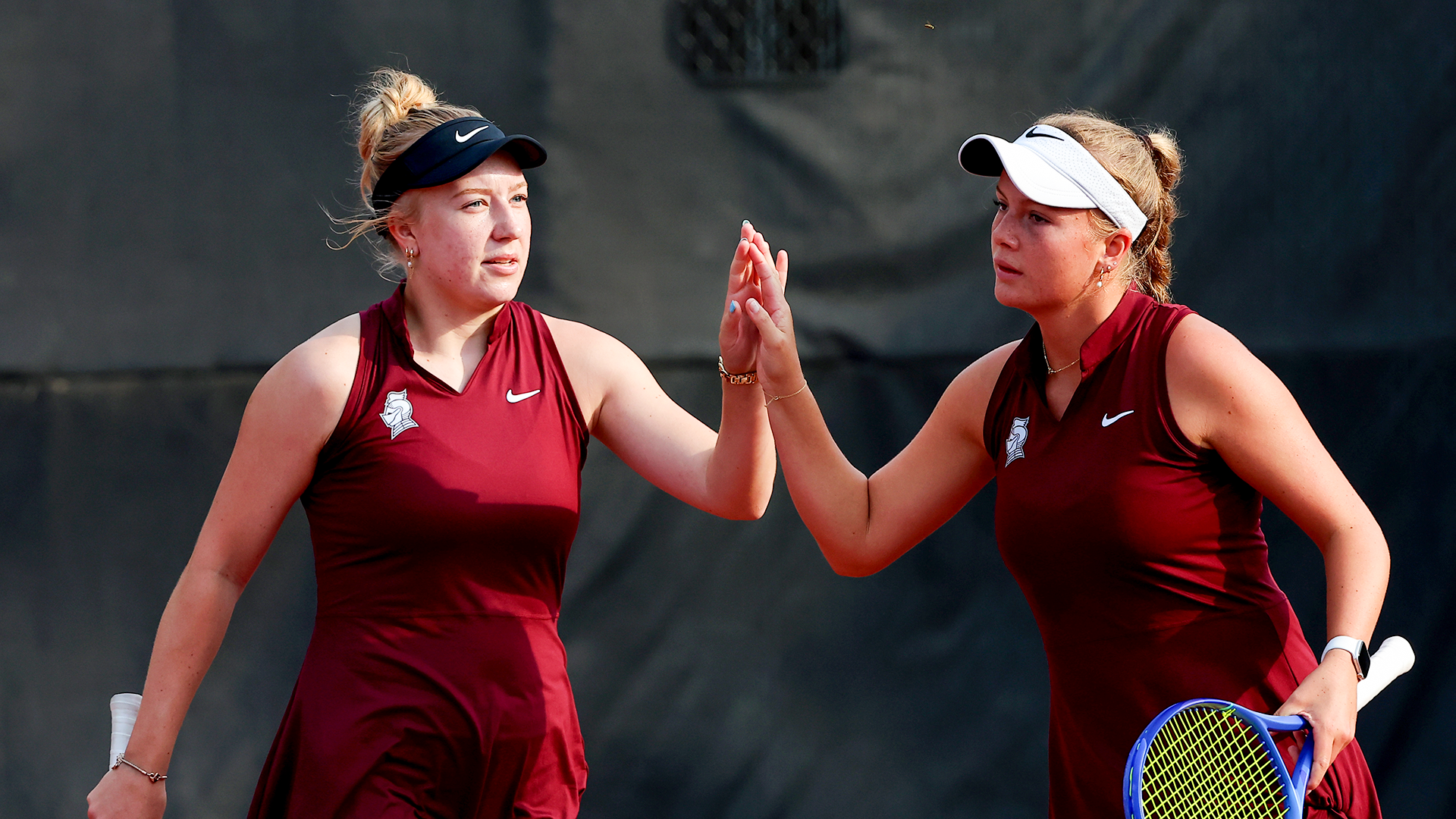 Vendula Kryslova and Reese Parker high-five