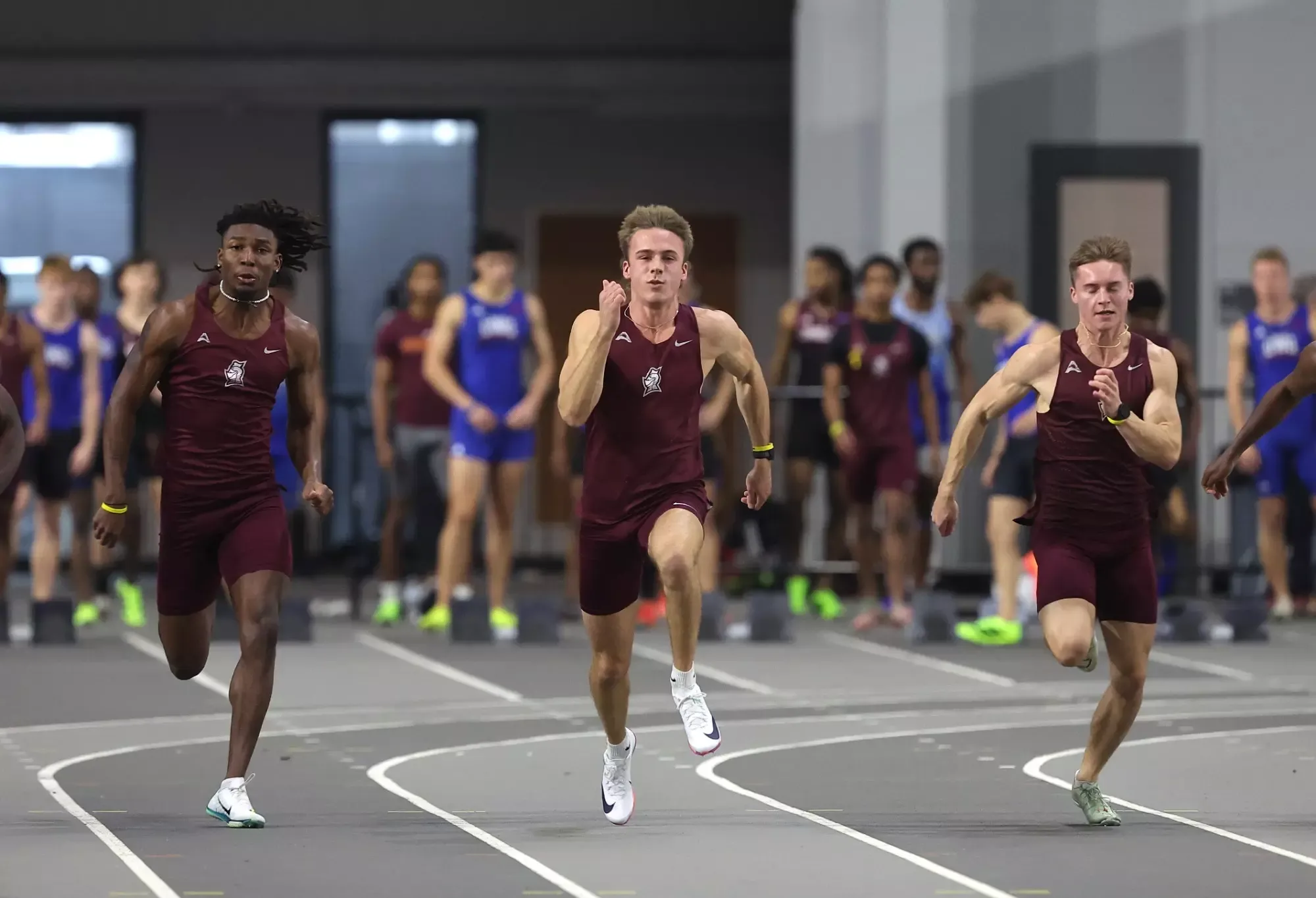 Men's sprinters compete at the Commonwealth College Opener.