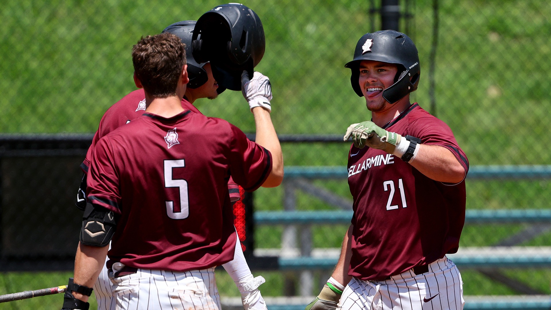 Charlie Rife is greeted by Landon Akers after a homer last season.