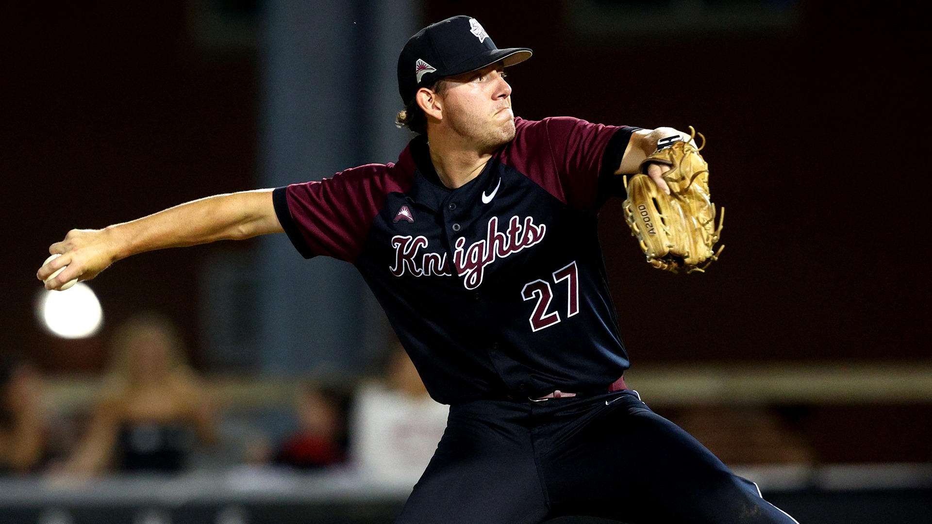 Chase Carver pitches in a game last season.