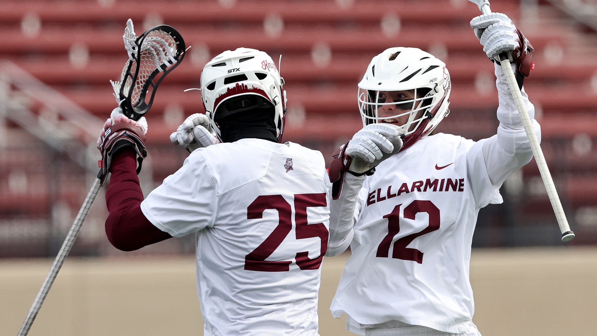 Joe Alie (25) and Hudson O'Hara celebrate a goal against St. Bonaventure.